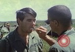 Image of Chaplain ministering to 199th Light Infantry Brigade South Vietnam, 1968, second 50 stock footage video 65675062056