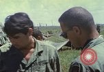 Image of Chaplain ministering to 199th Light Infantry Brigade South Vietnam, 1968, second 51 stock footage video 65675062056