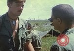 Image of Chaplain ministering to 199th Light Infantry Brigade South Vietnam, 1968, second 52 stock footage video 65675062056