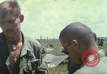 Image of Chaplain ministering to 199th Light Infantry Brigade South Vietnam, 1968, second 54 stock footage video 65675062056