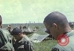 Image of Chaplain ministering to 199th Light Infantry Brigade South Vietnam, 1968, second 55 stock footage video 65675062056