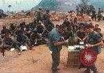 Image of catholic chaplain Vietnam, 1968, second 12 stock footage video 65675062058