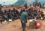 Image of catholic chaplain Vietnam, 1968, second 14 stock footage video 65675062058
