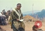 Image of catholic chaplain Vietnam, 1968, second 56 stock footage video 65675062058