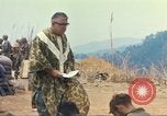 Image of catholic chaplain Vietnam, 1968, second 57 stock footage video 65675062058