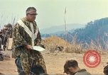 Image of catholic chaplain Vietnam, 1968, second 59 stock footage video 65675062058