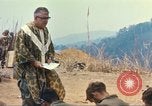 Image of catholic chaplain Vietnam, 1968, second 60 stock footage video 65675062058