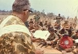 Image of catholic chaplain Vietnam, 1968, second 33 stock footage video 65675062059