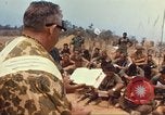 Image of catholic chaplain Vietnam, 1968, second 34 stock footage video 65675062059