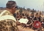 Image of catholic chaplain Vietnam, 1968, second 36 stock footage video 65675062059