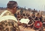 Image of catholic chaplain Vietnam, 1968, second 37 stock footage video 65675062059