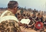 Image of catholic chaplain Vietnam, 1968, second 39 stock footage video 65675062059