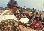 Image of catholic chaplain Vietnam, 1968, second 42 stock footage video 65675062059