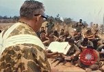 Image of catholic chaplain Vietnam, 1968, second 44 stock footage video 65675062059