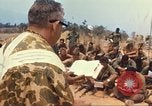 Image of catholic chaplain Vietnam, 1968, second 47 stock footage video 65675062059