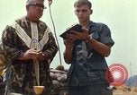 Image of catholic chaplain Vietnam, 1968, second 61 stock footage video 65675062059