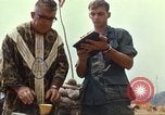 Image of catholic chaplain Vietnam, 1968, second 62 stock footage video 65675062059