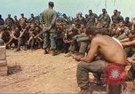 Image of catholic chaplain Vietnam, 1968, second 24 stock footage video 65675062060