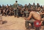 Image of catholic chaplain Vietnam, 1968, second 25 stock footage video 65675062060