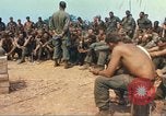 Image of catholic chaplain Vietnam, 1968, second 27 stock footage video 65675062060