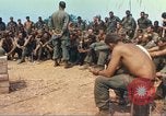 Image of catholic chaplain Vietnam, 1968, second 30 stock footage video 65675062060