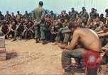 Image of catholic chaplain Vietnam, 1968, second 32 stock footage video 65675062060