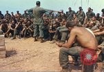 Image of catholic chaplain Vietnam, 1968, second 34 stock footage video 65675062060