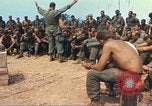 Image of catholic chaplain Vietnam, 1968, second 35 stock footage video 65675062060