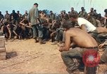Image of catholic chaplain Vietnam, 1968, second 36 stock footage video 65675062060
