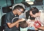 Image of United States dentist South Vietnam, 1968, second 52 stock footage video 65675062063
