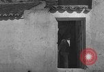 Image of Spanish villagers engaged in normal pursuits Spain, 1937, second 53 stock footage video 65675062078
