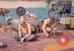 Image of U.S. Coast Guardsmen perform maintenance on LST  Iwo Jima, 1945, second 1 stock footage video 65675062154