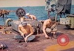 Image of U.S. Coast Guardsmen perform maintenance on LST  Iwo Jima, 1945, second 5 stock footage video 65675062154