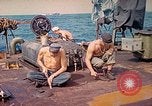 Image of U.S. Coast Guardsmen perform maintenance on LST  Iwo Jima, 1945, second 7 stock footage video 65675062154