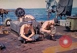 Image of U.S. Coast Guardsmen perform maintenance on LST  Iwo Jima, 1945, second 27 stock footage video 65675062154