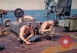 Image of U.S. Coast Guardsmen perform maintenance on LST  Iwo Jima, 1945, second 28 stock footage video 65675062154