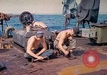 Image of U.S. Coast Guardsmen perform maintenance on LST  Iwo Jima, 1945, second 29 stock footage video 65675062154
