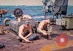 Image of U.S. Coast Guardsmen perform maintenance on LST  Iwo Jima, 1945, second 31 stock footage video 65675062154