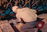 Image of U.S. Coast Guardsmen perform maintenance on LST  Iwo Jima, 1945, second 54 stock footage video 65675062154