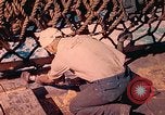 Image of U.S. Coast Guardsmen perform maintenance on LST  Iwo Jima, 1945, second 60 stock footage video 65675062154