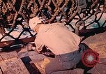 Image of U.S. Coast Guardsmen perform maintenance on LST  Iwo Jima, 1945, second 61 stock footage video 65675062154