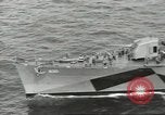 Image of Wounded transferred, ship-to-ship, on Stokes stretcher Mariana Islands, 1944, second 3 stock footage video 65675062229