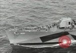 Image of Wounded transferred, ship-to-ship, on Stokes stretcher Mariana Islands, 1944, second 4 stock footage video 65675062229