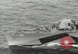 Image of Wounded transferred, ship-to-ship, on Stokes stretcher Mariana Islands, 1944, second 5 stock footage video 65675062229