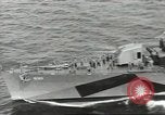 Image of Wounded transferred, ship-to-ship, on Stokes stretcher Mariana Islands, 1944, second 7 stock footage video 65675062229
