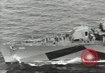 Image of Wounded transferred, ship-to-ship, on Stokes stretcher Mariana Islands, 1944, second 8 stock footage video 65675062229