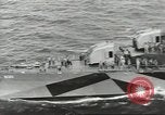 Image of Wounded transferred, ship-to-ship, on Stokes stretcher Mariana Islands, 1944, second 15 stock footage video 65675062229
