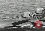 Image of Wounded transferred, ship-to-ship, on Stokes stretcher Mariana Islands, 1944, second 16 stock footage video 65675062229