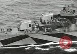 Image of Wounded transferred, ship-to-ship, on Stokes stretcher Mariana Islands, 1944, second 17 stock footage video 65675062229