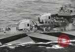 Image of Wounded transferred, ship-to-ship, on Stokes stretcher Mariana Islands, 1944, second 18 stock footage video 65675062229